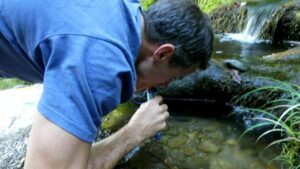 Personal water filter in use